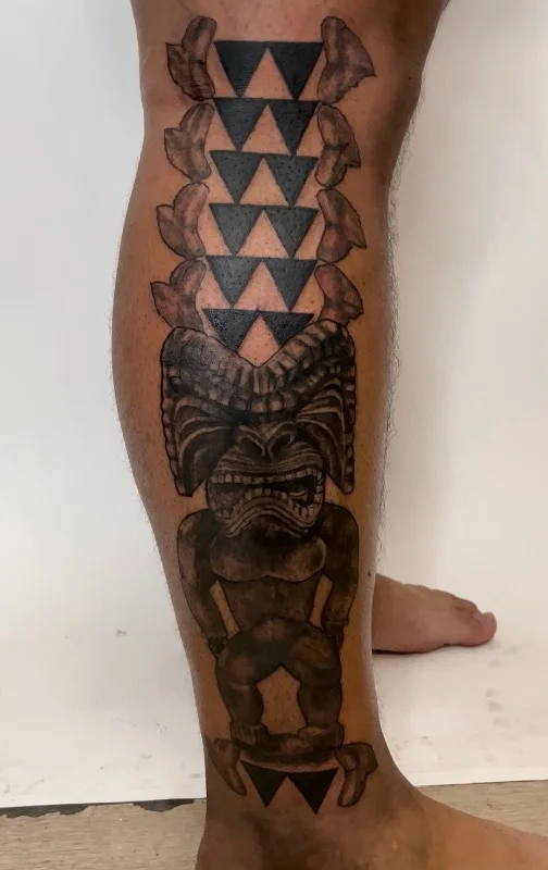 Benson Carlos Polynesian tribal tiki tattoo on calf, Hawaii