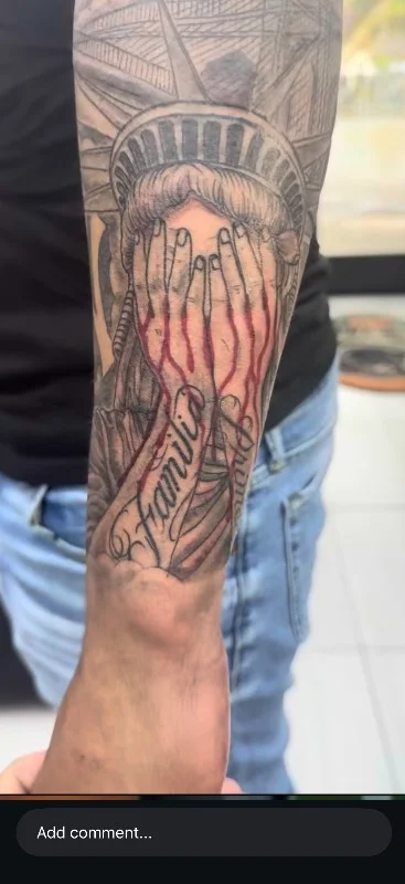 Benson Carlos black and gray realism tattoo of Statue of Liberty on forearm in Hawaii